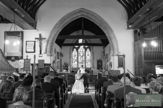 Wedding ceremony at St Andrews Church in Owslebury by Martin Bell Photography