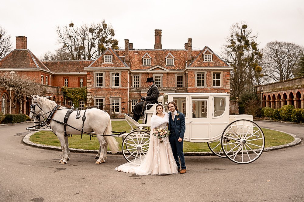 Holly and Elliot’s Spring wedding at Lainston House with horse drawn carriage by Martin Bell Photography