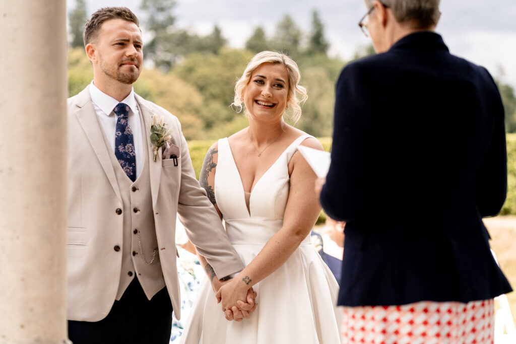 Outdoor ceremony - Rhinefield House Hotel Wedding photographer for Ellie & Sam's wedding day