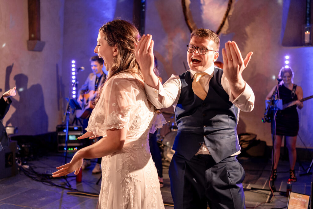 Fun evening party and full dance floor at The Great Barn Devon wedding