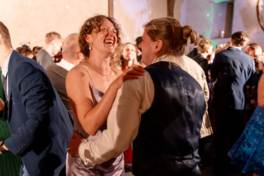 Fun evening party and full dance floor at The Great Barn Devon wedding