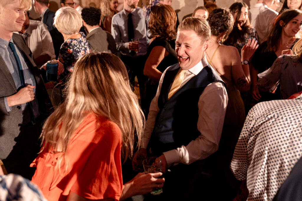 Fun evening party and full dance floor at The Great Barn Devon wedding