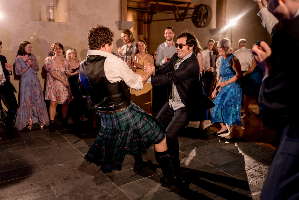Fun evening party and full dance floor at The Great Barn Devon wedding