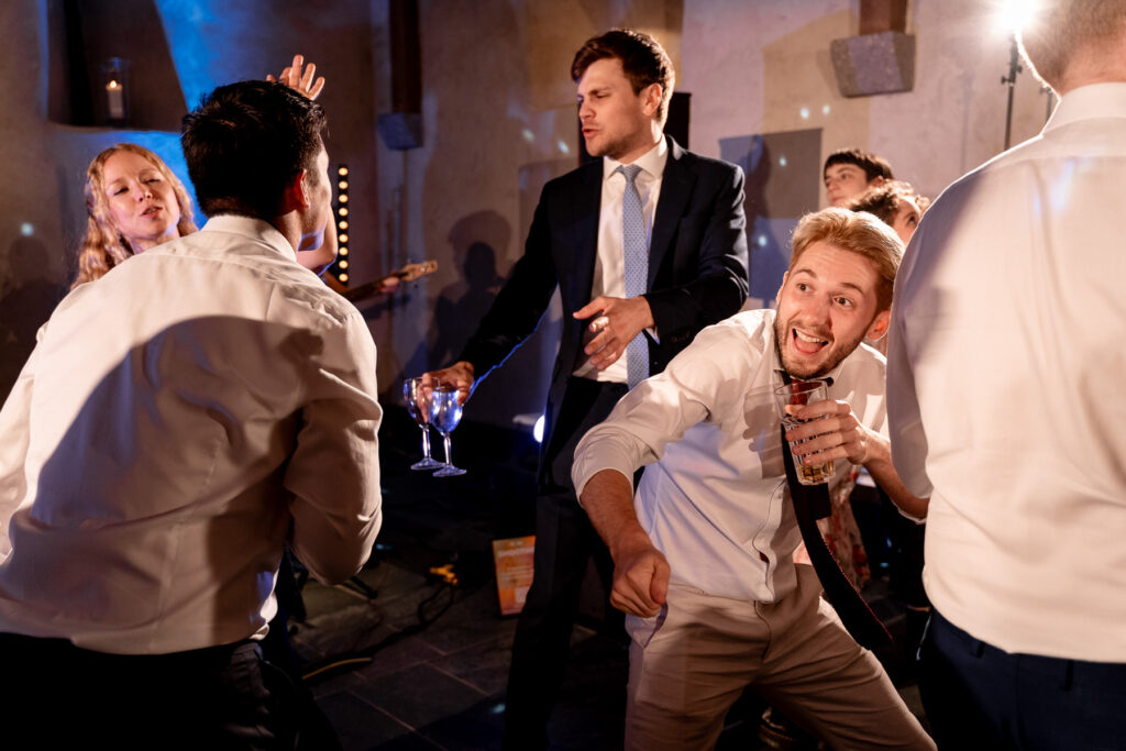 Fun evening party and full dance floor at The Great Barn Devon wedding