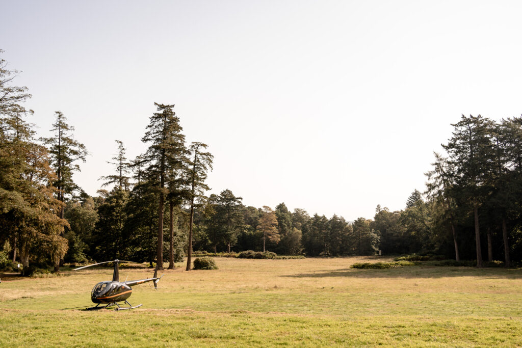 The stunning exterior of Rhinefield House Hotel surrounded by forest, one of Hampshire’s most beautiful wedding venues.