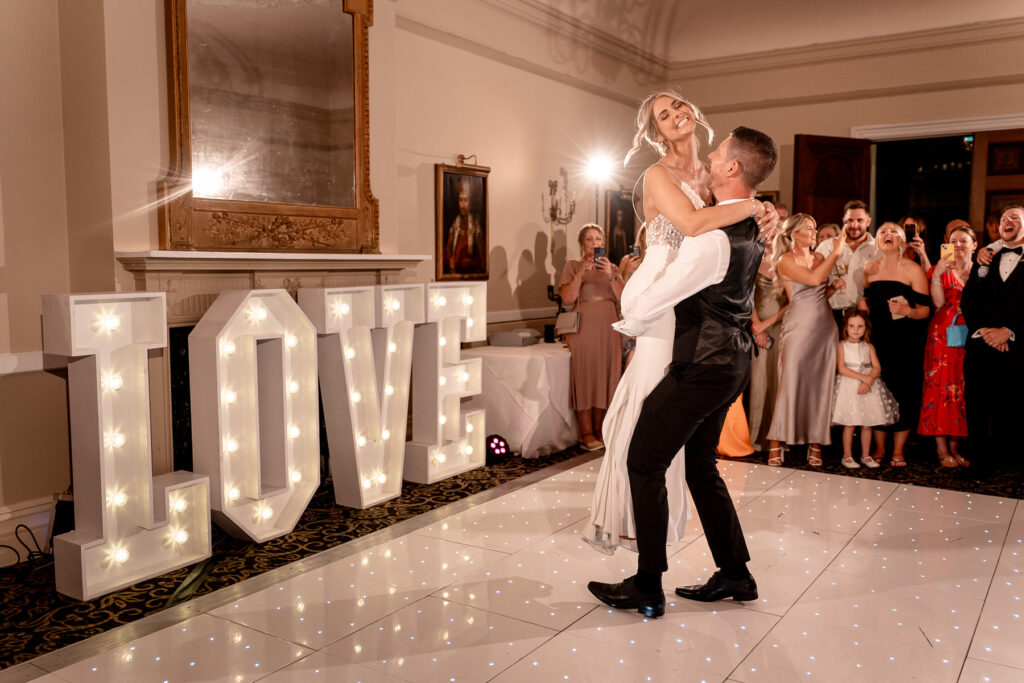 Megan and Dan’s elegant black-tie wedding at Rhinefield House in the New Forest, captured by Martin Bell Photography.