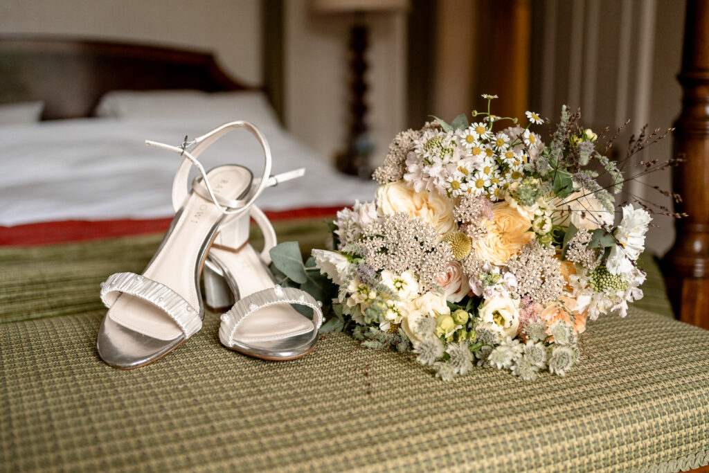 Yellow colour scheme bridal bouquet at a Summer wedding at Audleys Wood