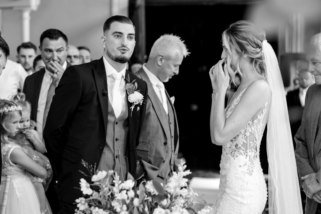 Grooms reaction to seeing his Bride at a Summer wedding at Audleys Wood