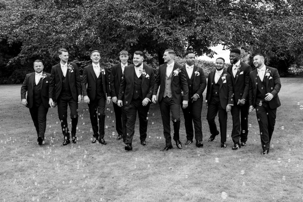 fun wedding photos of the Groomsmen at a Summer wedding at Audleys Wood