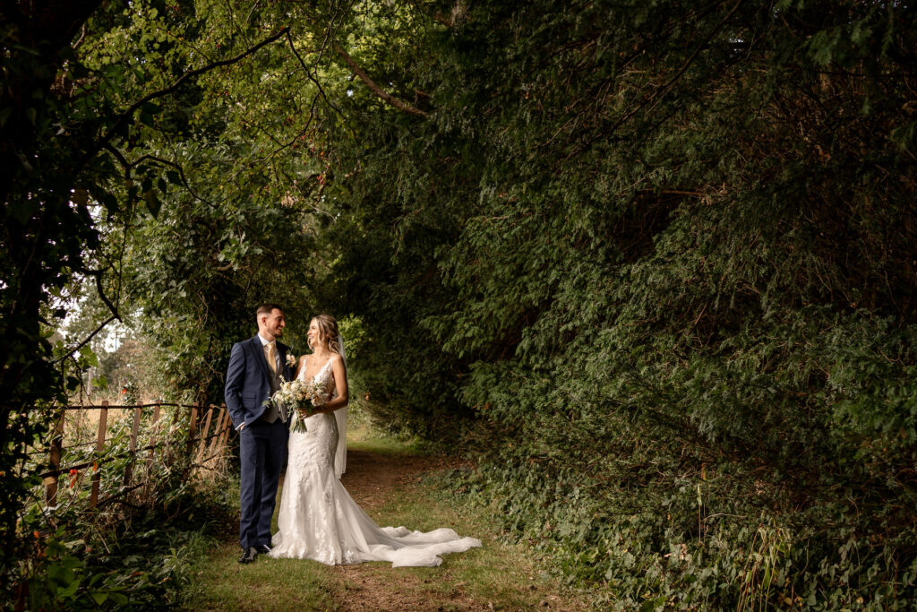 Bride and Groom portraits at a Summer wedding at Audleys Wood