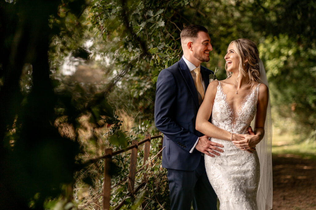 Bride and Groom portraits at a Summer wedding at Audleys Wood