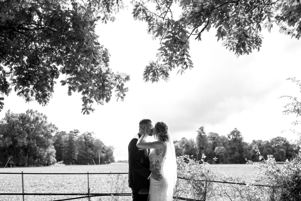 Bride and Groom portraits at a Summer wedding at Audleys Wood