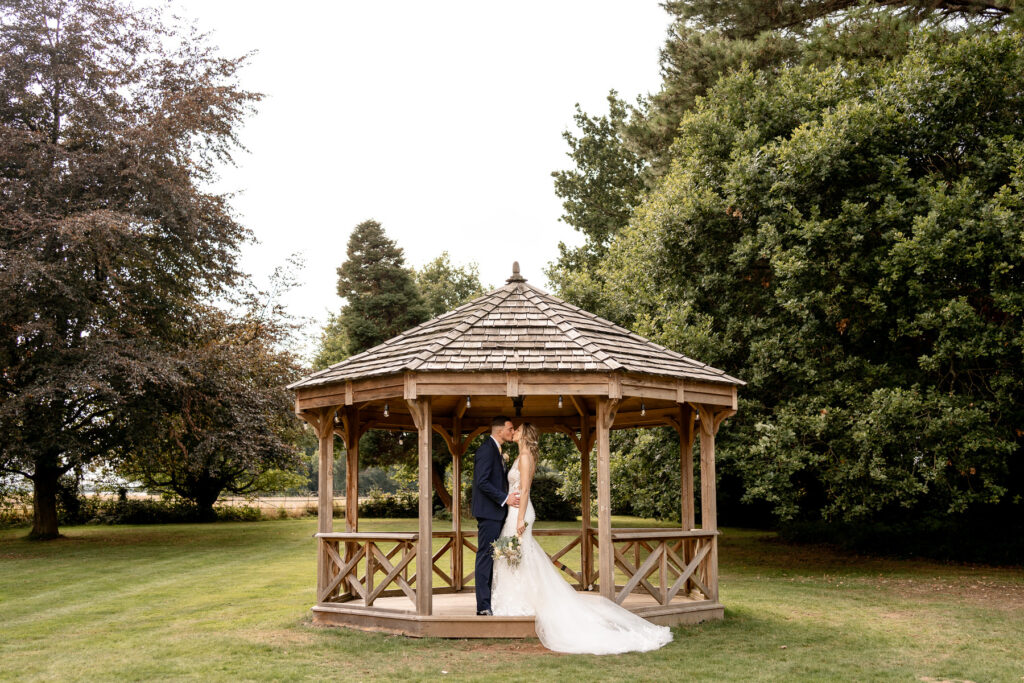 Bride and Groom portraits at a Summer wedding at Audleys Wood