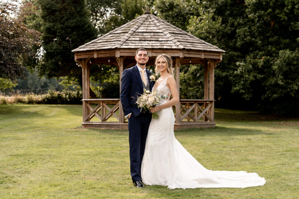 Bride and Groom portraits at a Summer wedding at Audleys Wood