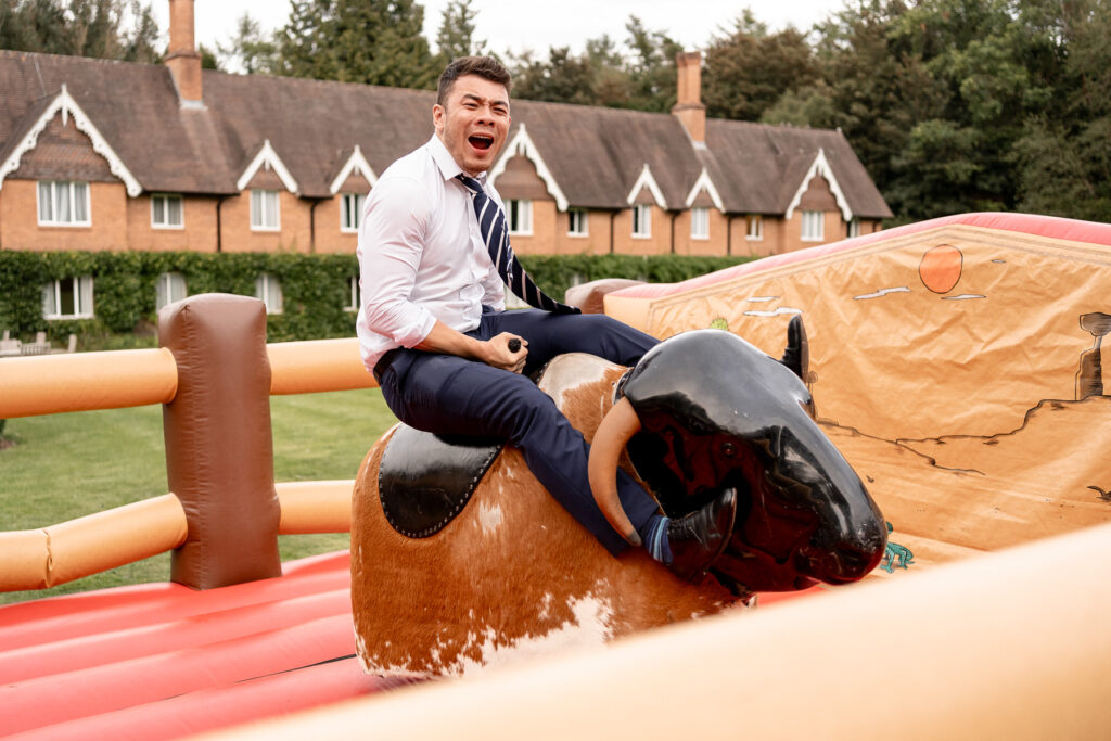 bucking bronco fun at a Summer wedding at Audleys Wood