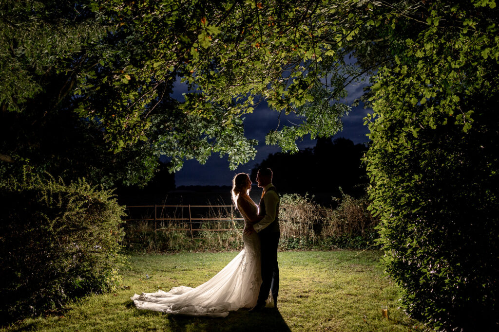 nighttime portraits at a Summer wedding at Audleys Wood